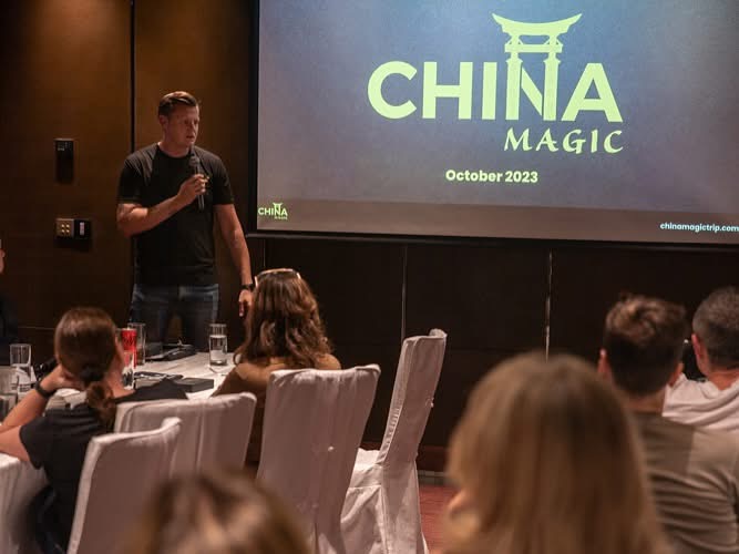 Lyden speaking at China Magic orientation
