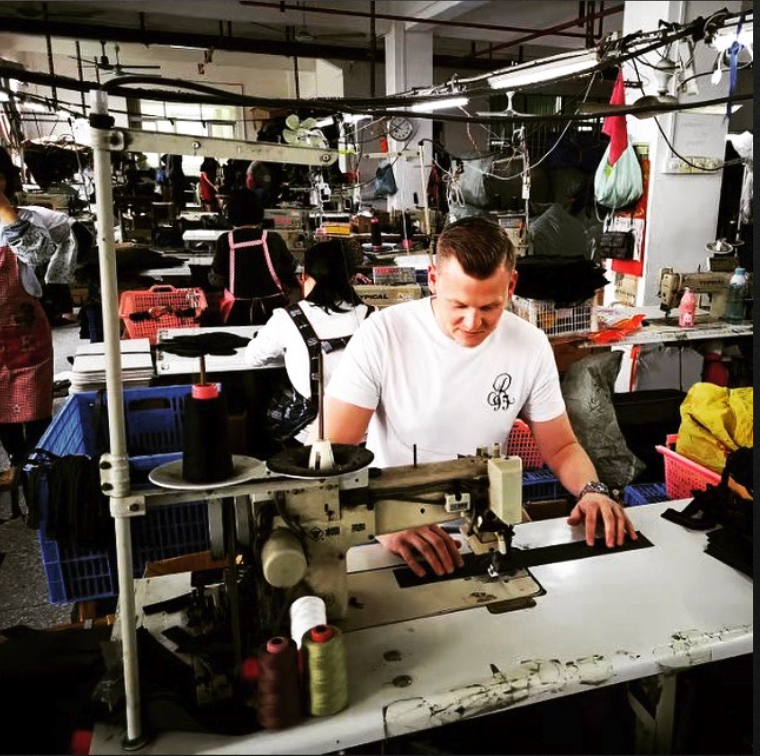Lyden at sewing machine in textile factory