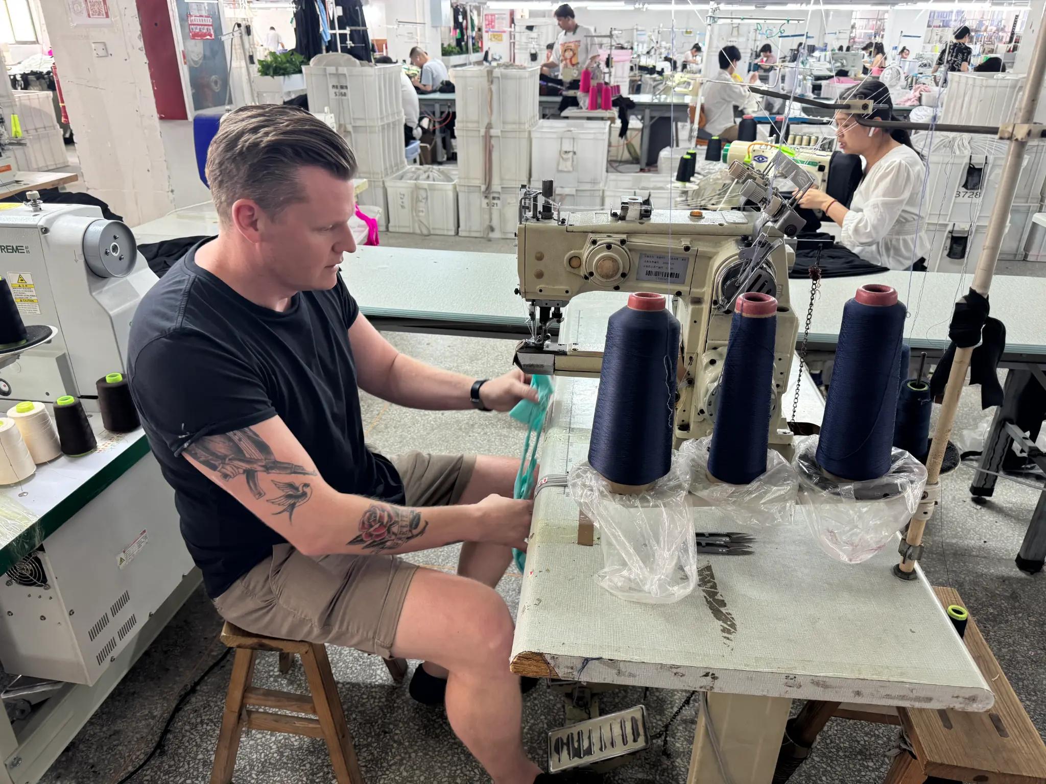 Lyden working at textile factory sewing machine